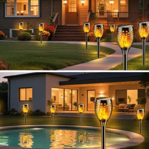 Decorative solar torch lights with flickering flame effect illuminating a garden pathway at dusk.