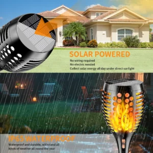 Decorative solar torch lights with flickering flame effect illuminating a garden pathway at dusk.