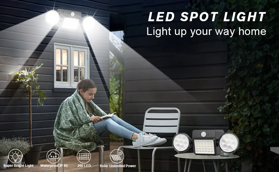 Outdoor wall lights mounted on a patio wall, illuminating garden space with solar-powered LED brightness