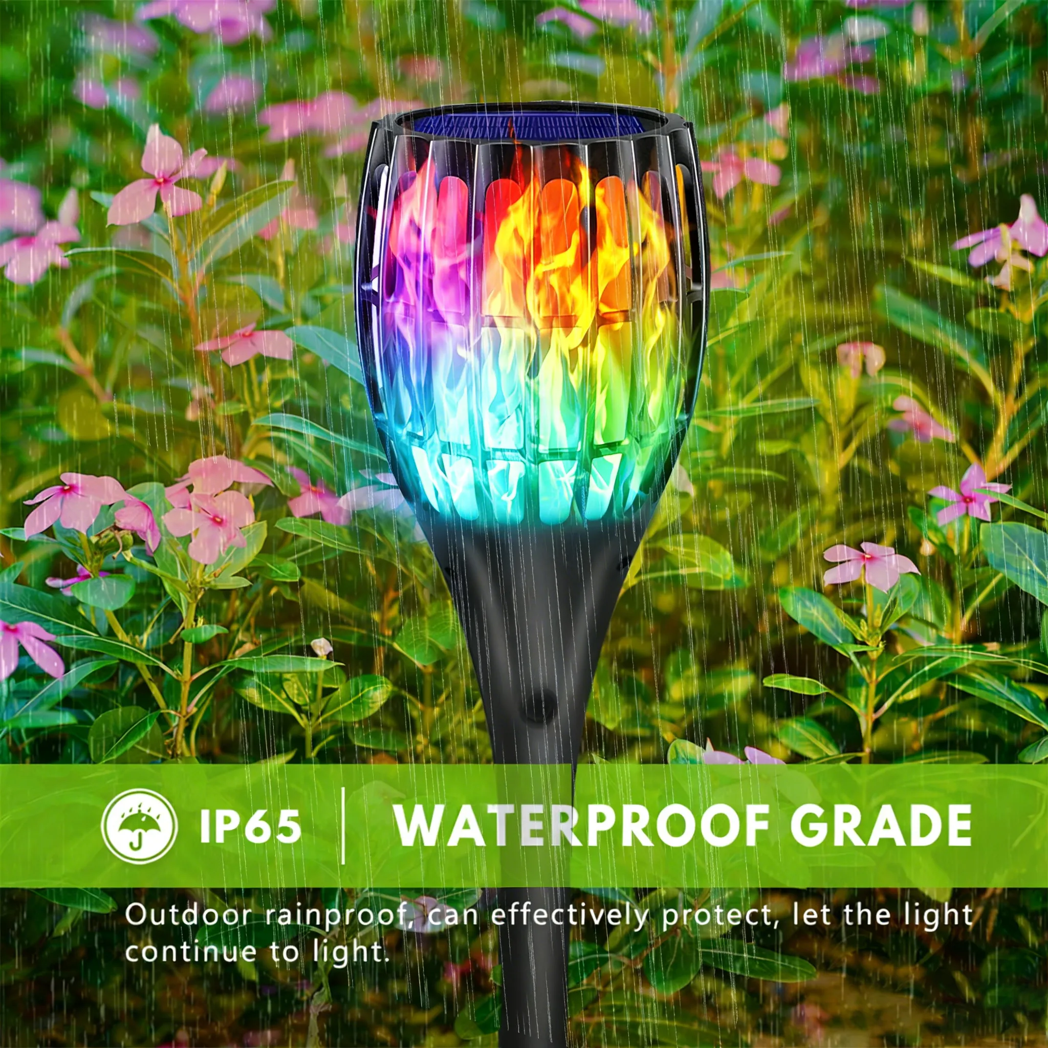 IP65 waterproof solar flame torch stake light with colorful flickering flame, rainproof ABS housing, outdoor landscape.